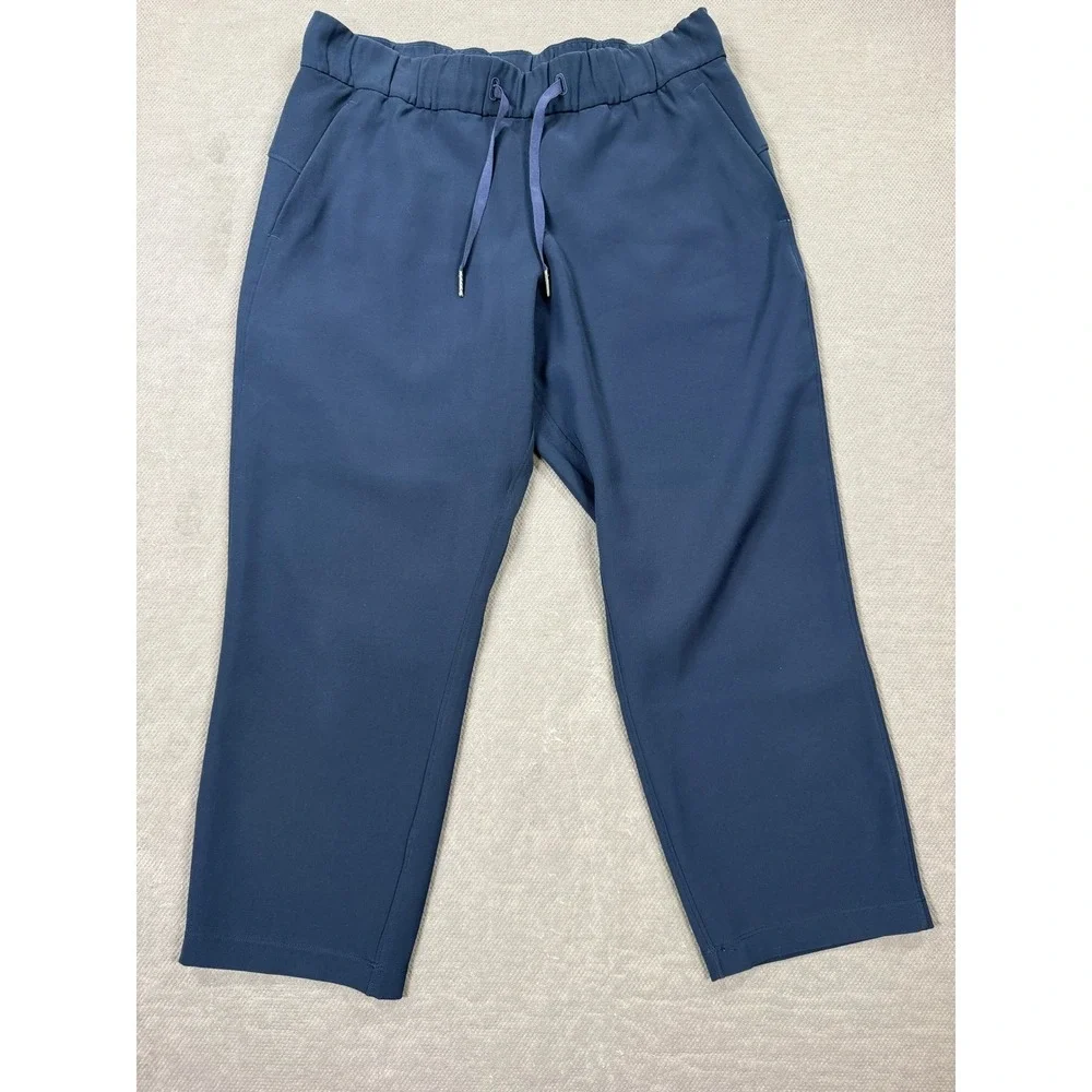 Lululemon On the Fly Crop 23 Navy Blue Drawstring Athletic Pants Size 8 LW6AVMS